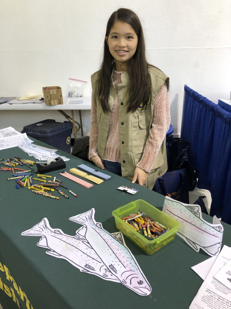 Booth at 2020 International Sportsmen's Expo in 2020 engages tests steelhead coloring skills. Photo: CDFW, Creative Commons
